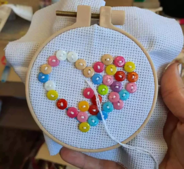 Broderie avec perle